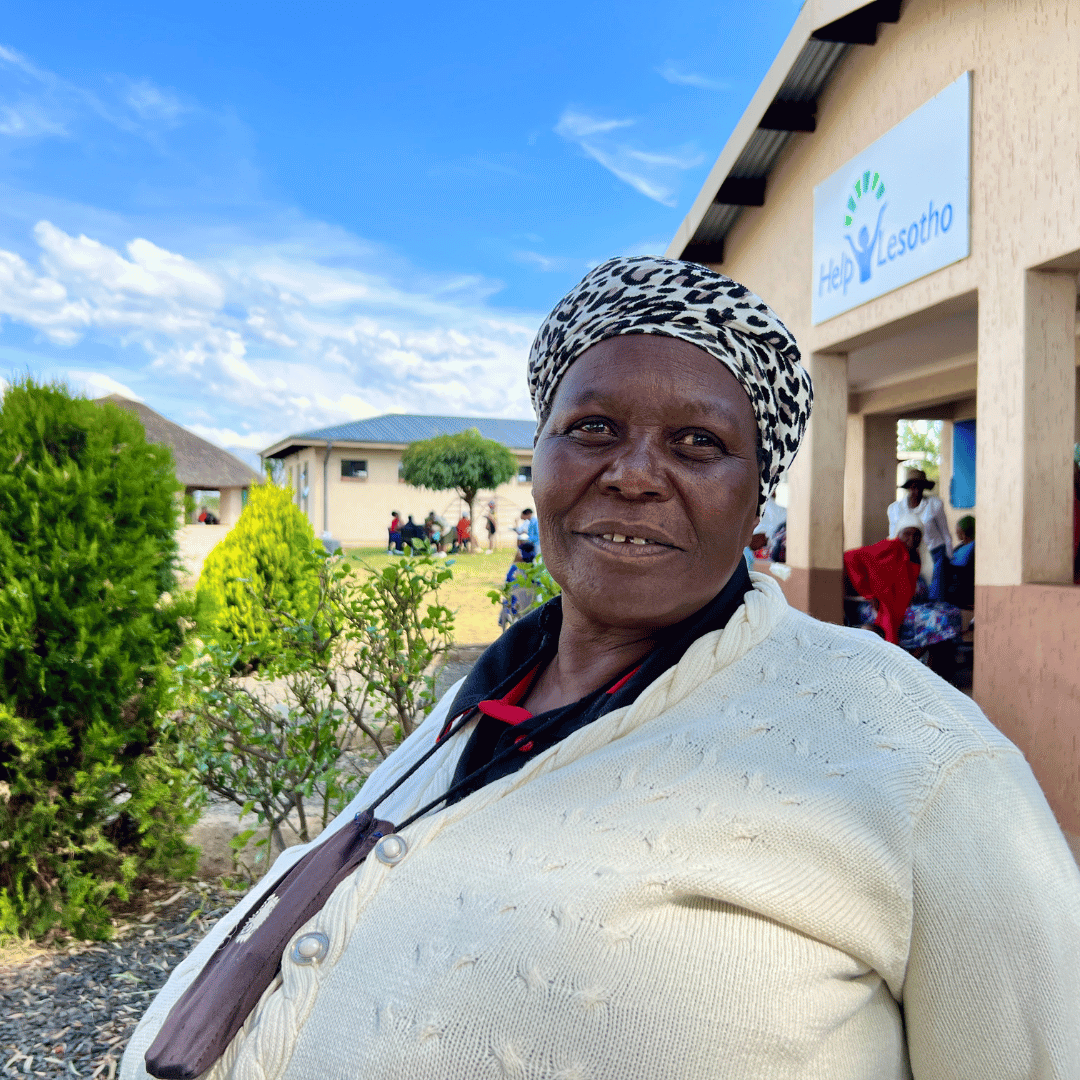 A grandmother smiles for the camera