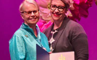 Dr. Peg Herbert accepts the Femmes Remarquables – Distinguished Women award!