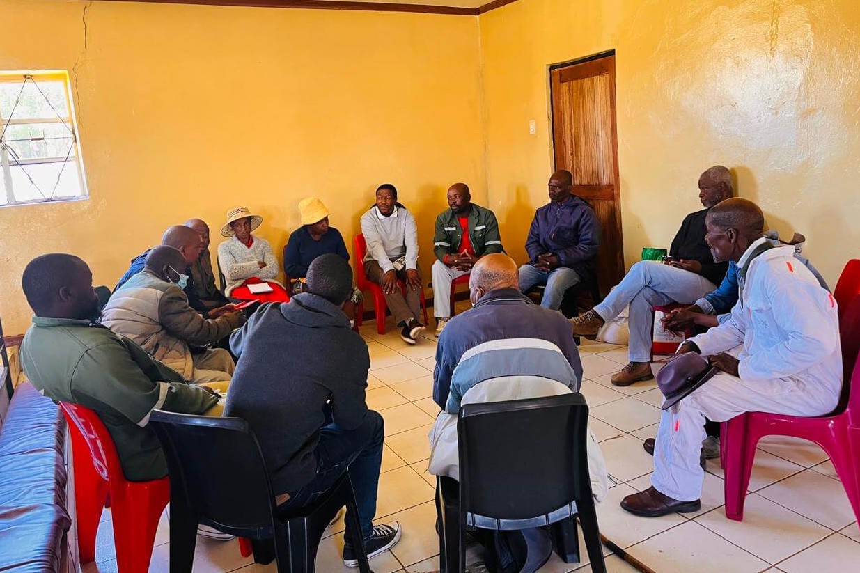 grandmothers in Lesotho having a conversation about grief